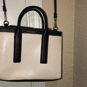 Tahari purse with the choice of and longer strap.